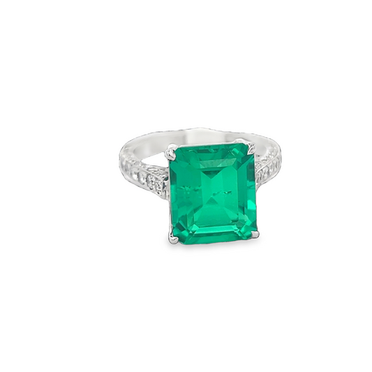 Platinum Emerald Ring with Round Diamonds