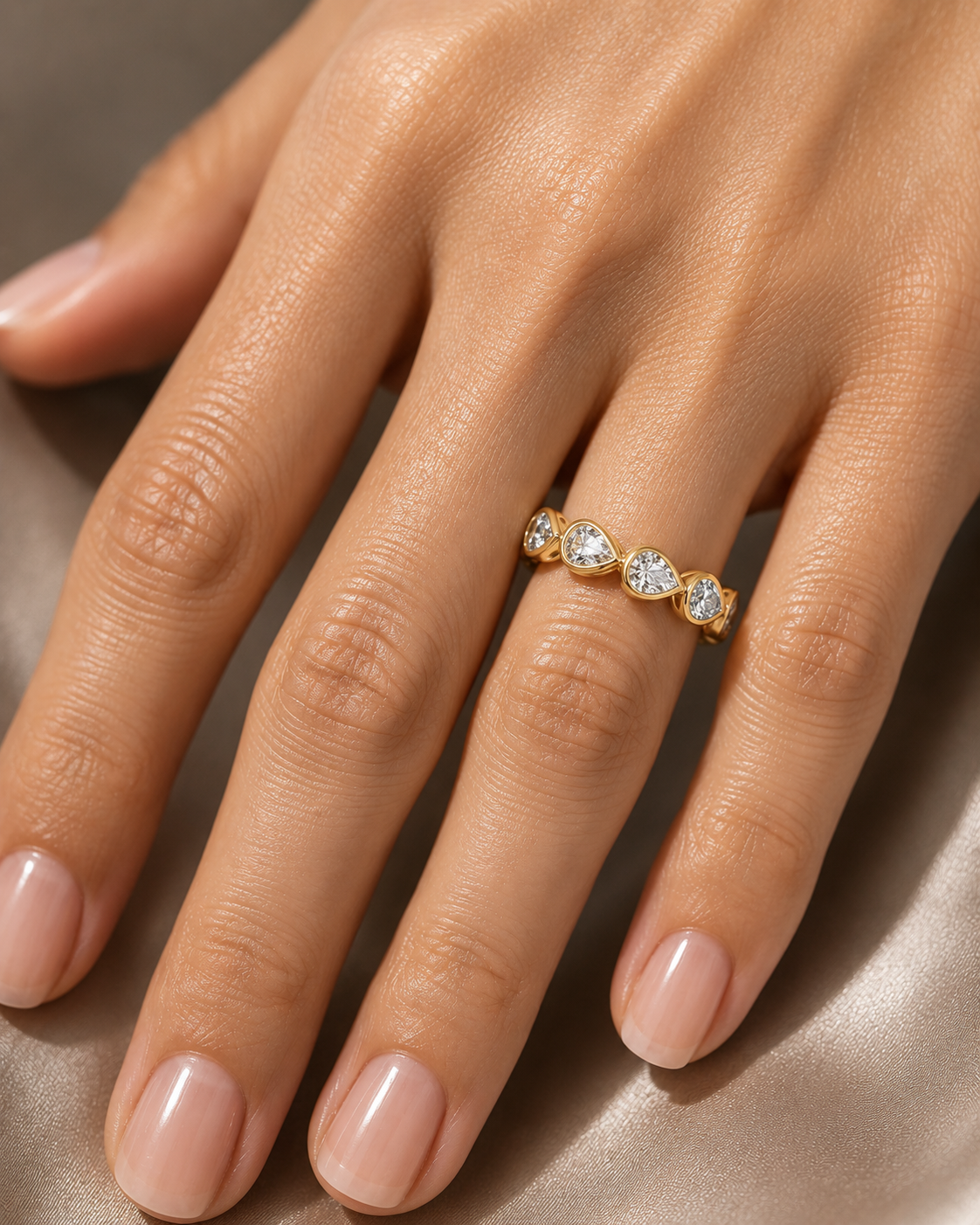 14Kt YG Pear Diamond Bezeled Ring
